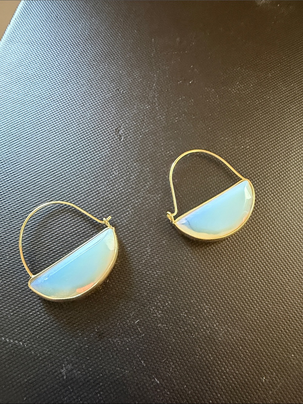 Gold Hoop Earrings with Opalescent Blue Half-Moon Stones